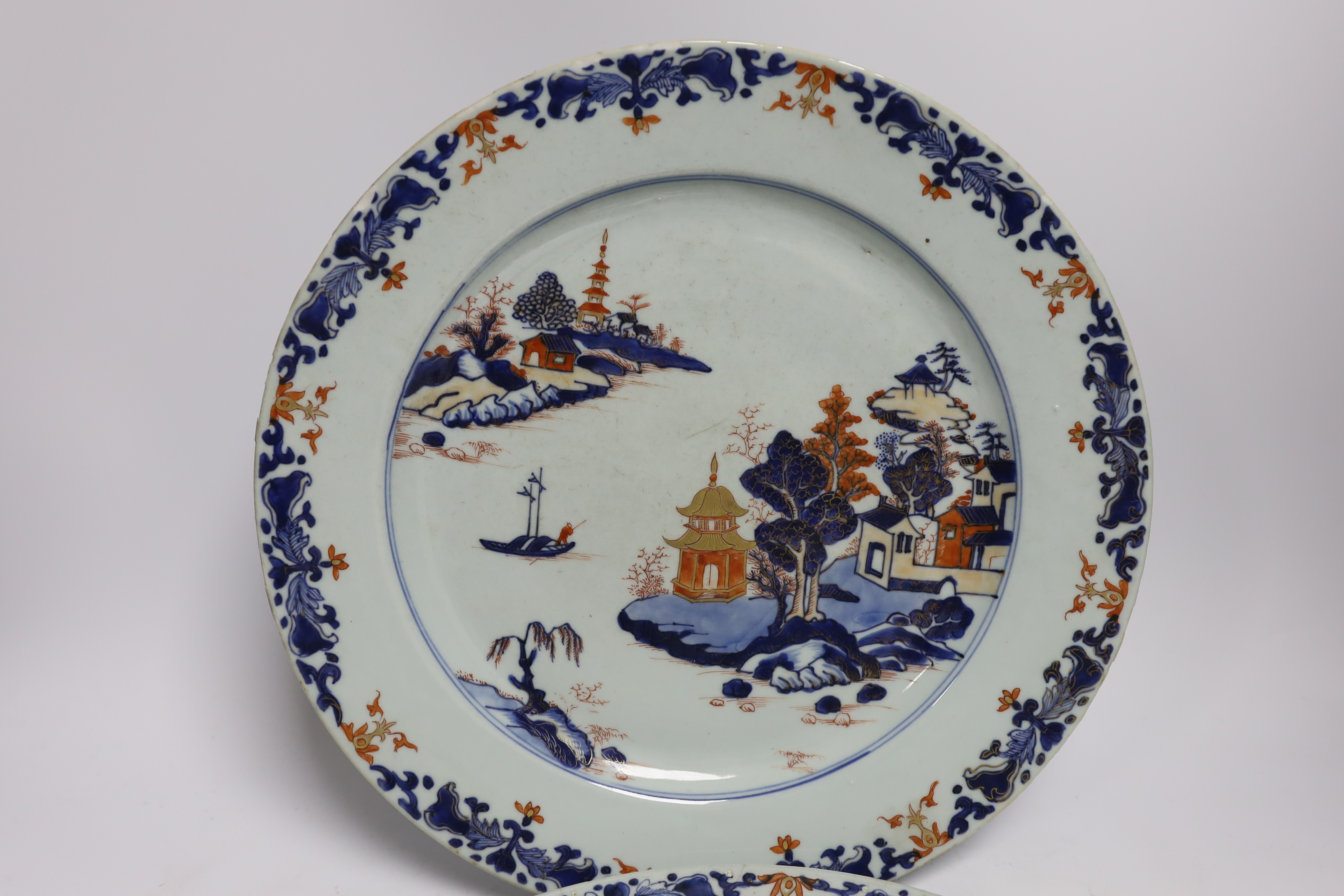 A pair of Chinese Imari landscape dishes, Qianlong period, 35cm diameter